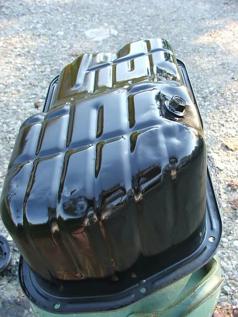 http://i70.photobucket.com/albums/i102/SR20drftSX/newoilpan.jpg