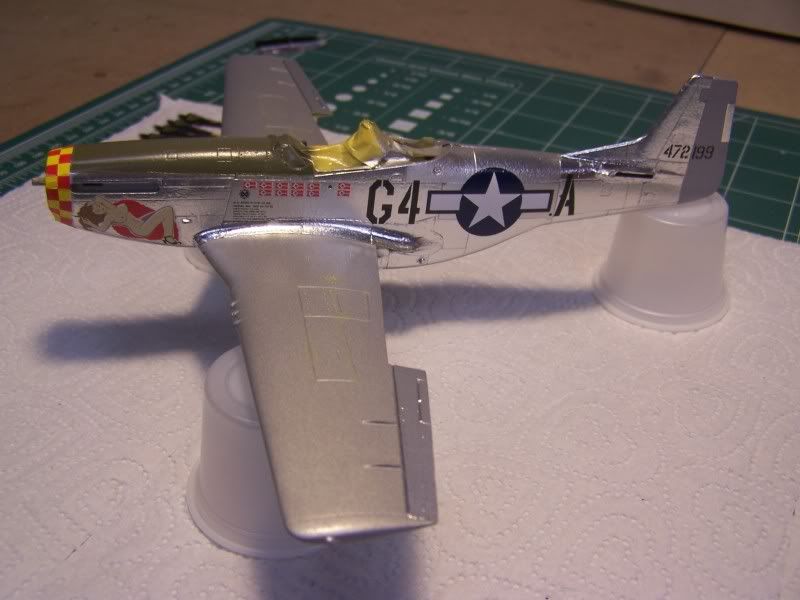 http://i70.photobucket.com/albums/i107/LancairIV/1-48%20Tamiya%20P-51D/100506StartedDecals001.jpg