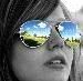 B&W girl wearing sunglasses (reflection color)