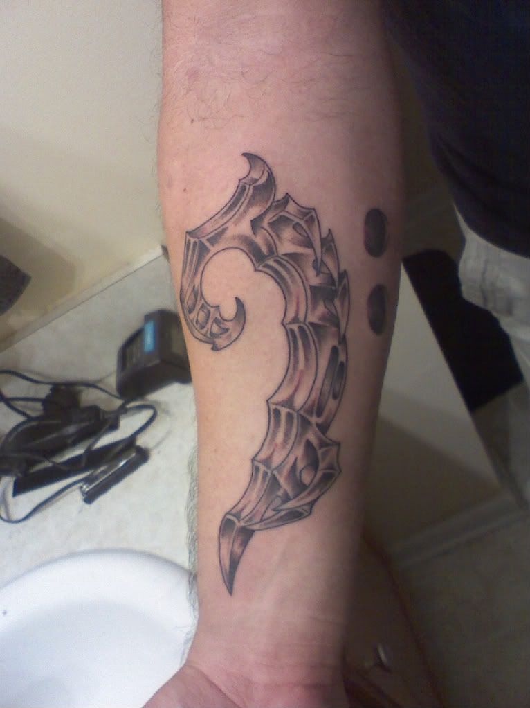 Time to get this thread back on track with a METAL bass clef tattoo.